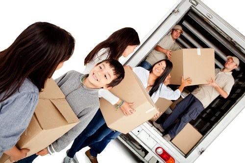 Removals van handling a home move in Rush Green