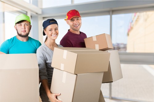 Careful handling of boxed items during a man and van service