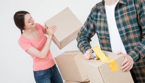 Checklist and boxes prepared for a home move in Rush Green