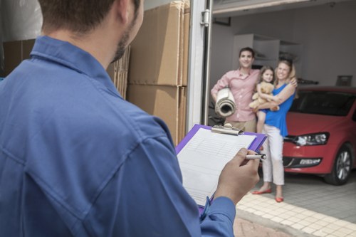 House movers preparing a residential move in Rush Green