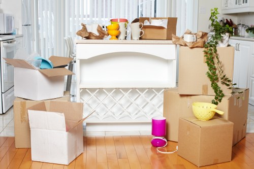 Household furniture and office items being loaded for transport