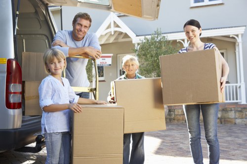 Packed boxes and furniture ready for a Rush Green home move