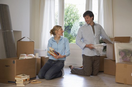 Household items prepared for transport with a Rush Green moving van