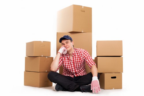 Packed moving boxes ready for a local Rush Green removal